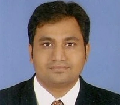 Dr. Tushar Warke